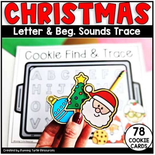 A hand holding a Christmas-themed cookie card with a Santa Claus design, part of a letter and begining sound tracing activity set.