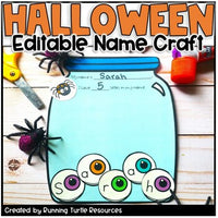 Editable Halloween-themed name craft activity with eyeball letters and a spider decoration on a wooden surface.