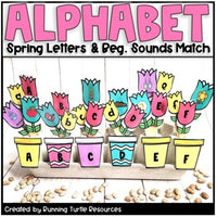 Photograph of an upside down egg carton with illustrations of flowers glued on popsicle sticks. Each flower has a letter on it to correspond with the colorful flower pots with letters on them.