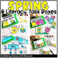 A set of spring-themed literacy task boxes with various cards and tasks designed for kindergarten education, presented on a table with decorative elements.